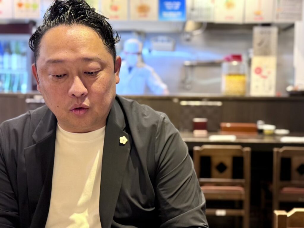 髙本泰輔さん(株式会社金沢商業活性化センター常務執行役員)取材時の様子